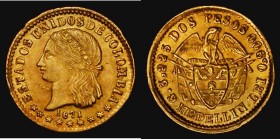 Colombia Two Pesos Gold 1871 KM#A154 slight flattening on the edge suggest possibly once mounted, GVF with no damage to the surfaces of the coin

Es...