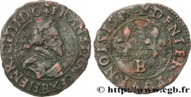 HENRY IV
Type : Denier tournois, type de Dieppe 
Date : 1593 
Mint name / Town : Dieppe 
Metal : copper 
Diameter : 18  mm
Orientation dies : 3  h.
We...