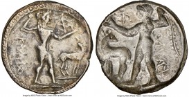 BRUTTIUM. Caulonia. Late 6th century BC. AR stater or nomos (24mm, 7.64 gm, 12h). NGC Choice VF 5/5 - 3/5. Ca. 530 BC. KAVΛO, full-length figure of Ap...