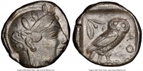 ATTICA. Athens. Ca. 455-440 BC. AR tetradrachm (24mm, 17.16 gm, 6h). NGC AU 3/5 - 4/5. Early transitional issue. Head of Athena right, wearing crested...