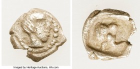 CARIA. Uncertain mint. Ca. 5th-4th centuries BC. AR tetartemorion (6mm, 0.25 gm, 5h). Choice VF. Head of youthful male right; dotted border / Head of ...