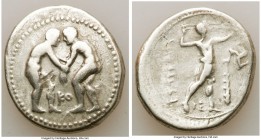 PAMPHYLIA. Aspendus. Ca. 325-250 BC. AR stater (25mm, 10.38 gm, 12h). Fine. Two wrestlers grappling; KO between / ΕΣΤFΕΔΙΥ, slinger standing right, pl...