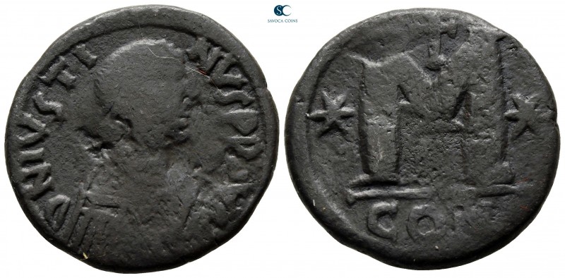 Justin I AD 518-527. From the Tareq Hani collection. Constantinople
Follis Æ
...