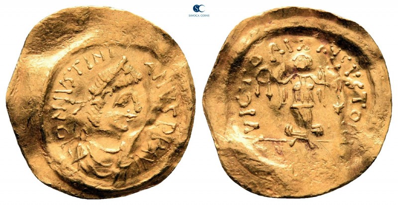 Justinian I AD 527-565. Constantinople
Tremissis AV

18 mm., 1,41 g.



v...
