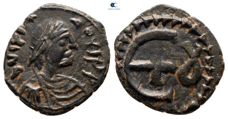 Justinian I AD 527-565. Theoupolis (Antioch)
Pentanummium Æ

14 mm., 1,98 g....