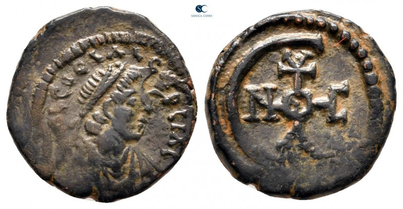 Justinian I AD 527-565. Theoupolis (Antioch)
Pentanummium Æ

16 mm., 2,02 g....