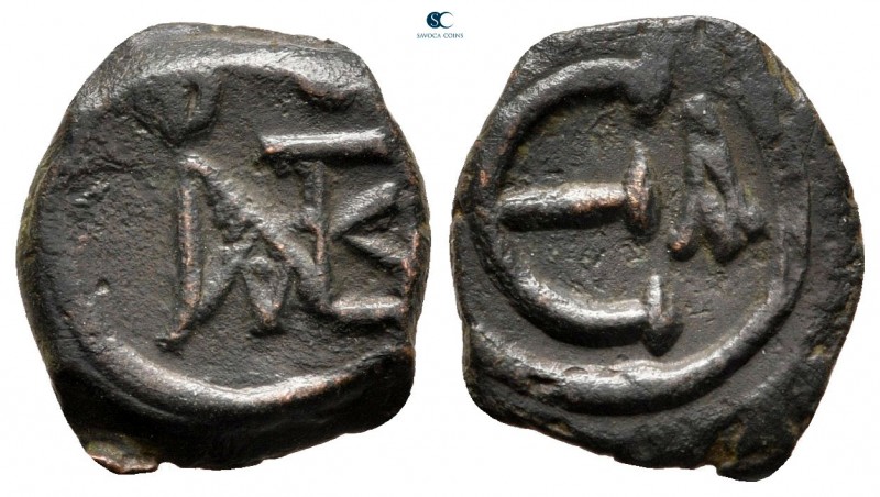 Justin II AD 565-578. Constantinople
Pentanummium Æ

15 mm., 2,13 g.



v...