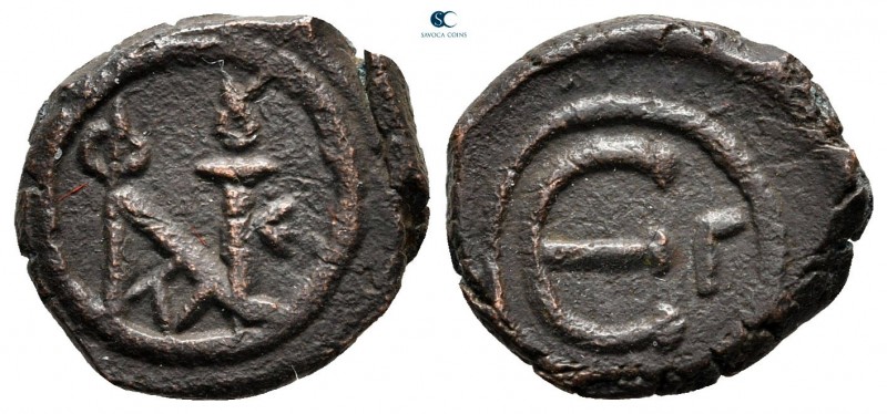 Justin II and Sophia AD 565-578. Constantinople
Pentanummium Æ

14 mm., 2,52 ...
