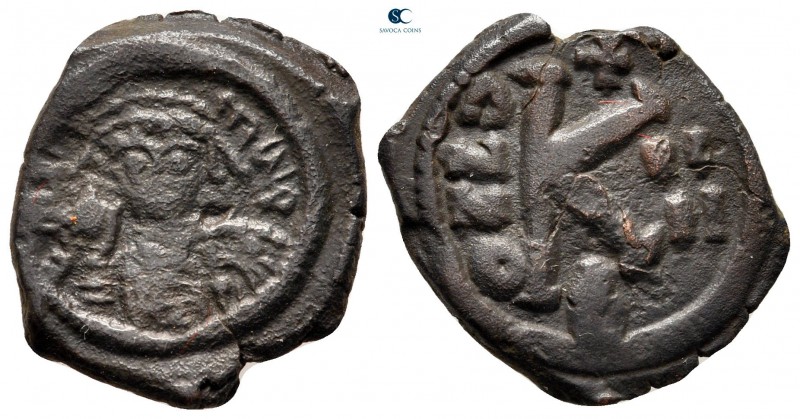 Maurice Tiberius AD 582-602. Constantinople
Half Follis or 20 Nummi Æ

20 mm....
