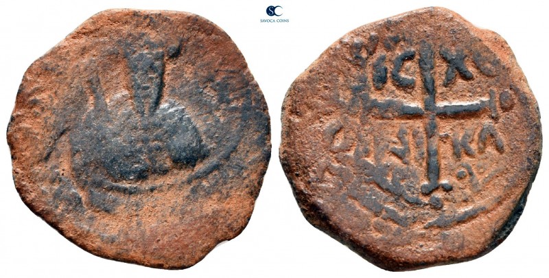 Tancred. As regent AD 1104-1112. Antioch
Follis Æ

22 mm., 3,09 g.



fin...