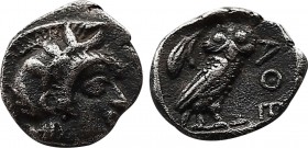 Attica. Athens. c. 450 BC. Obol, 0.64g. 8,5mm (h). Obv: Head of Athena right, wearing Attic helmet, adorned with three olive leaves. Rx: ΑΘΕ Owl stand...