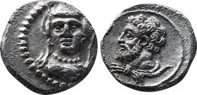 CILICIA. Uncertain mint. 4th century BC. AR obol (0.74 gm 9,9mm ). Head of Herakles left, lion's skin tied at neck / Veiled female bust facing slightl...