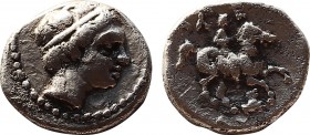 Greek
Kings of Macedon. Pella. Philip II. 359-336 BC. AR 10,7mm., 1,15g. Head of Apollo right / ΦIΛIΠΠOY, crowning youth, holding wreath, on horse tro...