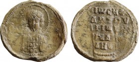 Byzantine Lead Seal Johannes (11th Century)
Obverse: bust of Saint Michael, frontal, wearing halo, khlayms. Pearl border.
Back: 5 (five) lines of text...