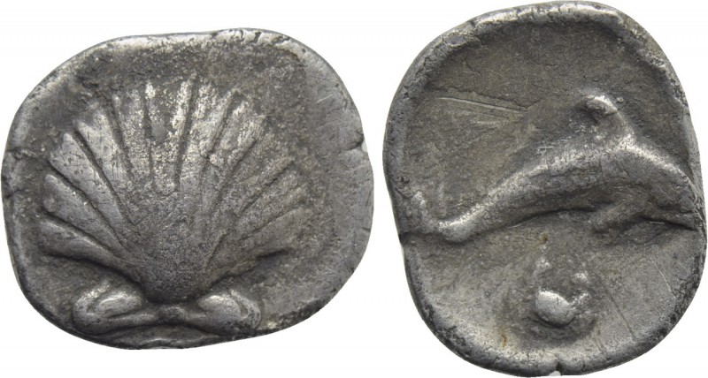 CALABRIA. Tarentum. Litra (Circa 325-280 BC). 

Obv: Scallop shell.
Rev: Dolp...