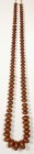 AFRIKA. 
KETTEN. Hochzeitskette Amber-Copal Handelsperlen, 89 kugelige seitlich abgeflachte Perlen F 15-45mm, Kette L. ca. 160cm. .