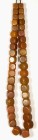 AFRIKA. 
KETTEN. Kopal-Perlenkette 40 würfelförmige Perlen, 22-32mm, Kette L. ca. 110cm. .