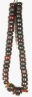 AFRIKA. 
PERLEN. Strang alter und seltener Karneolperlen zylinderförmige und scheibenförmige dunkelbraune leicht transparente Perlen F 19 -33mm ca. 4...