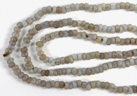 AFRIKA. 
PERLEN. Westafrika. Handelsperlen (Moon beads) opalähnliche Steine, hellblaue runde Scheibenperlen, F 13-14mm, 3 Stränge je ca. 70cm je ca. ...
