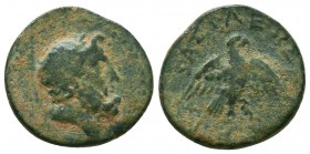 Seleukid Kingdom. Sardeis. Achaios 220-214 BC. Bronze Æ Laureate head of Zeus right. / BAΣ[IΛEΩ]Σ A[XAIOY], eagle with open wings, standing facing on ...