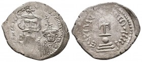 Constans II AR Hexagram. Constantinople, AD 654-659. Crowned facing busts of Constans and Constantine IV; cross in field above / Cross potent set on g...