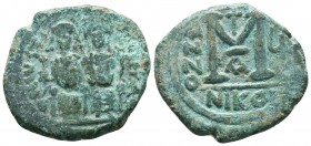 Justin II , with Sophia (565-578 AD). AE Follis 

Condition: Very Fine

Weight:13 gram 
Diameter: 30,36