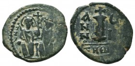 Justin II , with Sophia (565-578 AD). AE 

Condition: Very Fine

Weight: 2,6 gram
Diameter: 19,3