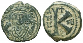 Maurice Tiberius. 582-602. AE half follis 

Condition: Very Fine

Weight: 5,5 gram
Diameter: 21,5