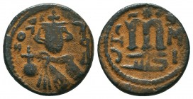 ARAB-BYZANTINE. Early Caliphate (636-660). Ae Fals. 

Condition: Very Fine

Weight: 3,4 gram
Diameter: 18
