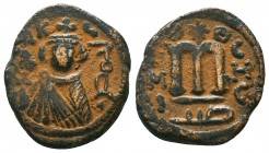 ARAB-BYZANTINE. Early Caliphate (636-660). Ae Fals. 

Condition: Very Fine

Weight: 4,5 gram
Diameter: 20,9