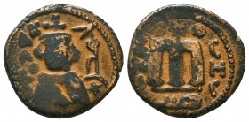 ARAB-BYZANTINE. Early Caliphate (636-660). Ae Fals. 

Condition: Very Fine

Weight: 4,1 gram
Diameter: 19,1