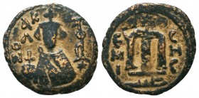 ARAB-BYZANTINE. Early Caliphate (636-660). Ae Fals. 

Condition: Very Fine

Weight: 3,7 gram
Diameter: 20,7