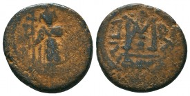 ARAB-BYZANTINE. Early Caliphate (636-660). Ae Fals. 

Condition: Very Fine

Weight: 4,7 gram
Diameter: 18,4