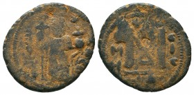 ARAB-BYZANTINE. Early Caliphate (636-660). Ae Fals. 

Condition: Very Fine

Weight: 3,6 gram
Diameter: 20,3