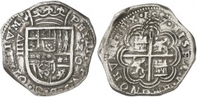 1597. Felipe II. Granada. M. 8 reales. (AC. 648). Tipo "OMNIVM". Dos restos de soldadura en anverso. Muy rara, sólo hemos tenido un ejemplar sin la fe...
