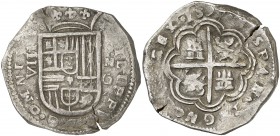 1597. Felipe II. Granada. M. 8 reales. (AC. 648 var) (AC. pdf 648.1). Tipo "OMNIVM". Valor VIII rectificado sobre IIIV. Buen ejemplar. Muy rara. ¿Únic...