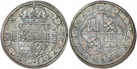 1597. Felipe II. Segovia. 8 reales. (AC. 718). Preciosa pátina. Tipo "OMNIVM". Rara y más así. 26,88 g. EBC-.