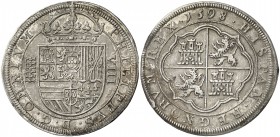 1598. Felipe II. Segovia. 8 reales. (AC. 719). Tipo "OMNIVM". Leves sombras. Parte de brillo original. Muy rara y más así. 26,66 g. EBC.