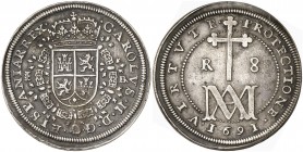 1691/87. Carlos II. Segovia. BR. 8 reales. (AC. 775). Tipo "María". Concreciones en anverso. Muy rara. Sólo hemos tenido otro ejemplar con esta rectif...