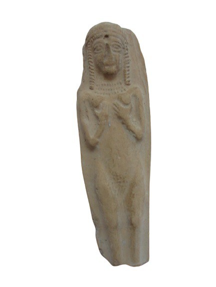Clay plaque depicting the female goddess Astarte holding her breasts with the ha...