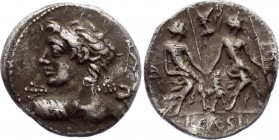 Roman Republic Denarius 112 - 111 BC Lucius Caesius
Obv: Bust of Vejovis hurling thunderbolt. Rev: Two Lares seated with hound, bust of Vulcan above....