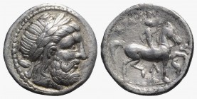 Celtic, Eastern Europe, imitating Philip II of Macedon, c. 3rd century BC. AR Tetradrachm (25mm, 14.19g, 11h). Laureate head of Zeus r. R/ Rider on ho...