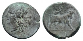 Southern Campania, Neapolis, c. 270-250 BC. Æ (21mm, 6.44g, 3h). Laureate head of Apollo l. R/ Man-headed bull standing r., being crowned by Nike who ...