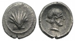 Southern Apulia, Tarentum, c. 470-450 BC. AR Litra (7mm, 0.38g, 12h). Cockle shell within linear circle. R/ Female head r. Vlasto 1153; HNItaly 840; S...