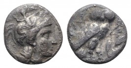 Southern Apulia, Tarentum, c. 302-280 BC. AR Drachm (15mm, 3.10g, 1h). Helmeted head of Athena r., helmet decorated with Skylla throwing stone. R/ Owl...