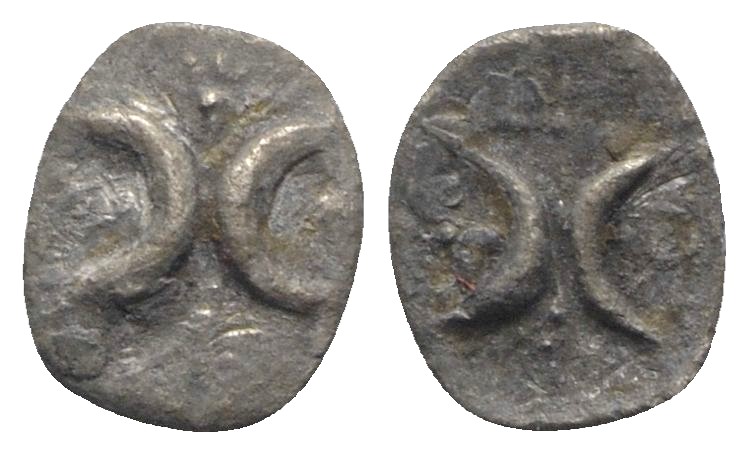 Southern Apulia, Tarentum, c. 280-228 BC. AR Hemiobol (6mm, 0.13g). Two crescent...