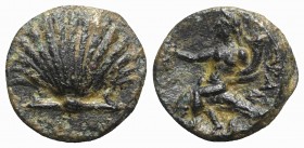 Southern Apulia, Tarentum, c. 275-200 BC. Æ (13mm, 2.21g, 7h). Shell. R/ Phalanthos, holding kantharos and cornucopia, riding dolphin l. Vlasto 1824; ...
