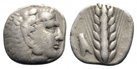 Southern Lucania, Metapontion, c. 430-400 BC. AR Stater (20mm, 7.20g, 2h). Head of Herakles r., wearing lion skin. R/ Barley ear; fly to l. Noe 428; H...
