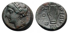 Southern Lucania, Thourioi, after 280 BC. Æ (15.5mm, 3.33g, 11h). Laureate head of Apollo l. R/ Kithara; monogram below. HNItaly 1926; SNG ANS 1198. G...