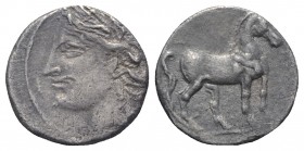 Bruttium, Carthaginian occupation, c. 215-205 BC. AR Quarter Shekel (12mm, 1.72g, 12h). Wreathed head of Tanit-Demeter l. R/ Horse standing r. HNItaly...